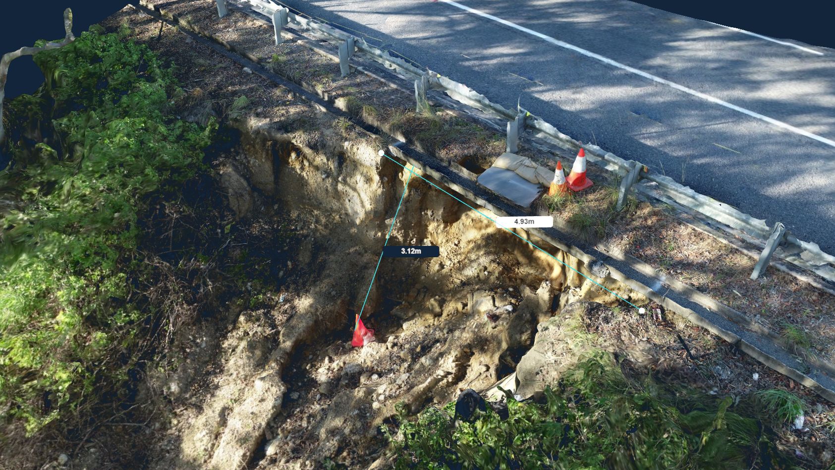Textured 3D model of a road embankment failure with the scarp measured at 3.12 m depth and 4.93 m width
