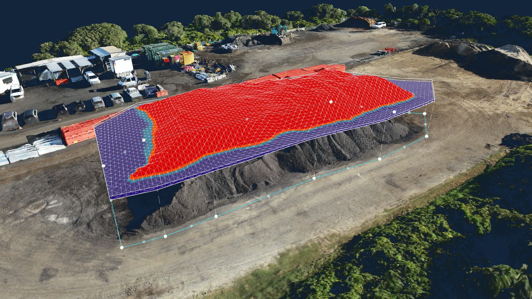 Stockpile volumetric surface generated from drone capture, with the computed surface overlaid on the material