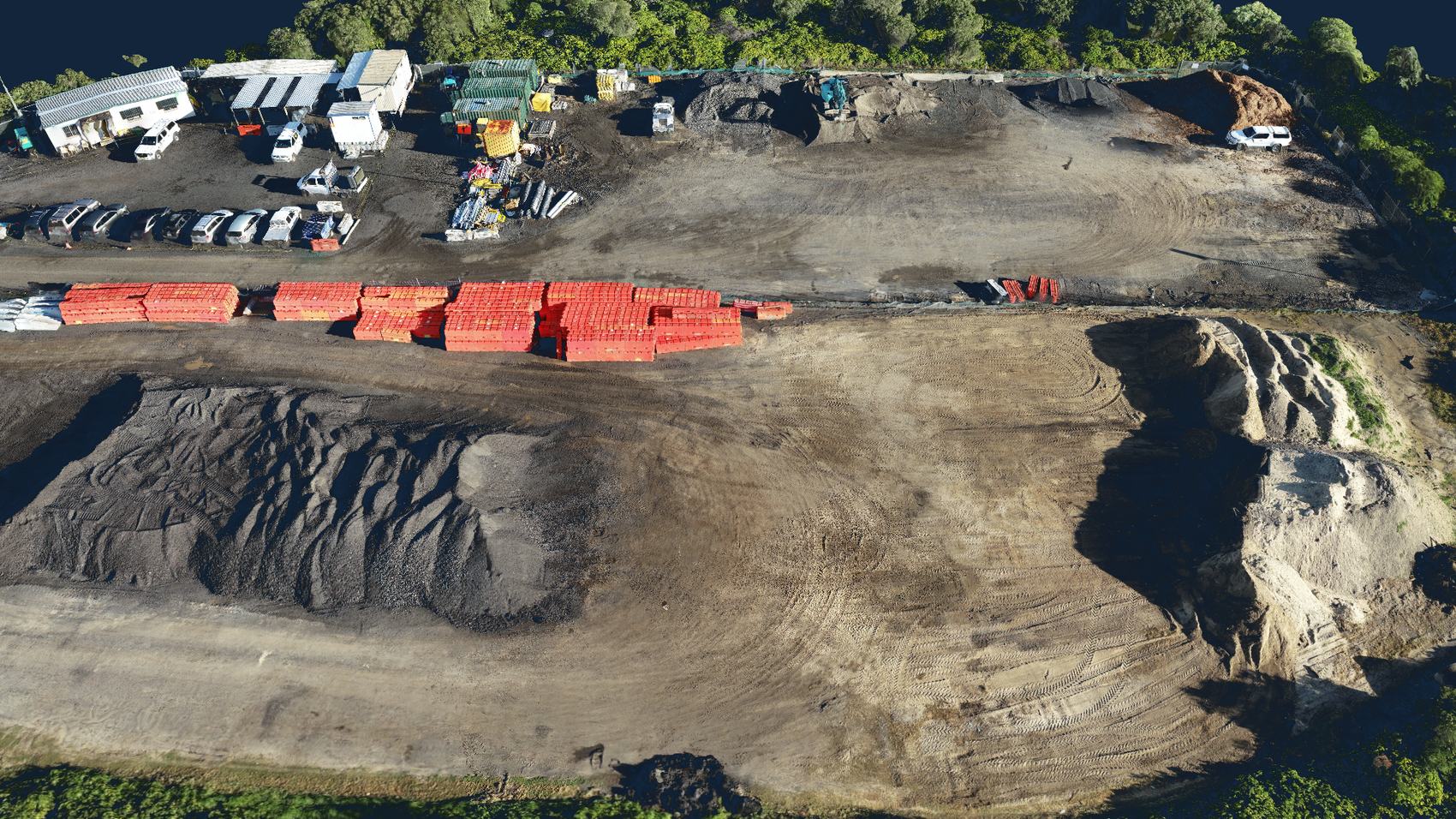 Orthomosaic of a works depot showing stockpiles, barrier stock and hardstand
